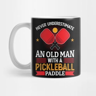 An old man with a pickleball paddle Mug